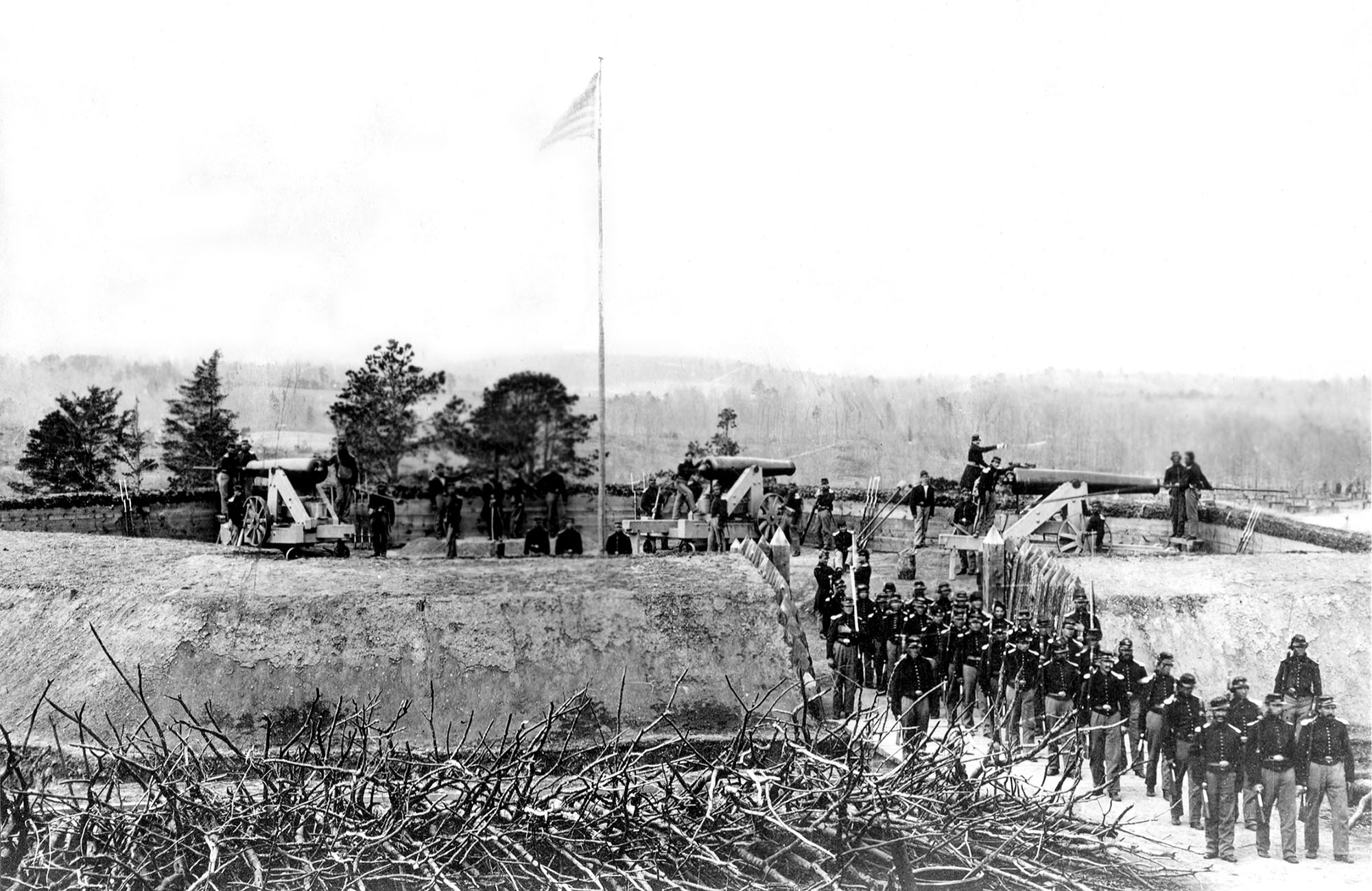 a medium view of a round earthen fort with weapons and soldiers marching out from it a medium view of a round earthen fort with weapons and soldiers marching out from it